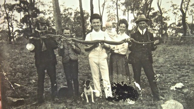 Frank Smith (baby) with his mother & family with Aboriginal elder ( Billy Lynch)